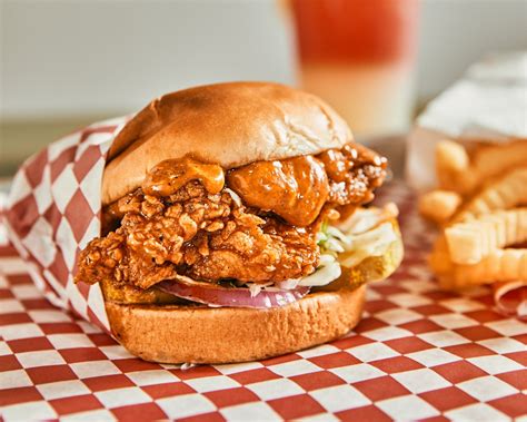 Hot chi chicken - Nashville Hot Chicken Sandwich. Hand breaded and cooked to perfection, on a toasted brioche bun. Our dill pickle chips down below with STL cheese on top, served with a side of Chuck's sauce! Order Pickup. Hand Breaded Chicken Strips. Hand breaded chicken strips, plain or dipped in your preferred heat Nashville hot sauce. Served with a side of ...